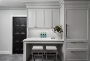 Entire view of custom white cabinetry kitchen