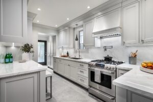 Entire view of custom white cabinetry kitchen