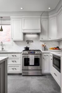 Entire view of custom white cabinetry kitchen