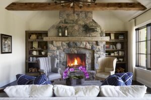 Entire view of custom cabinetry behind the fireplace