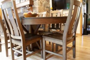 Custom extendable wooden dining room set with seating for 8 in dining room.